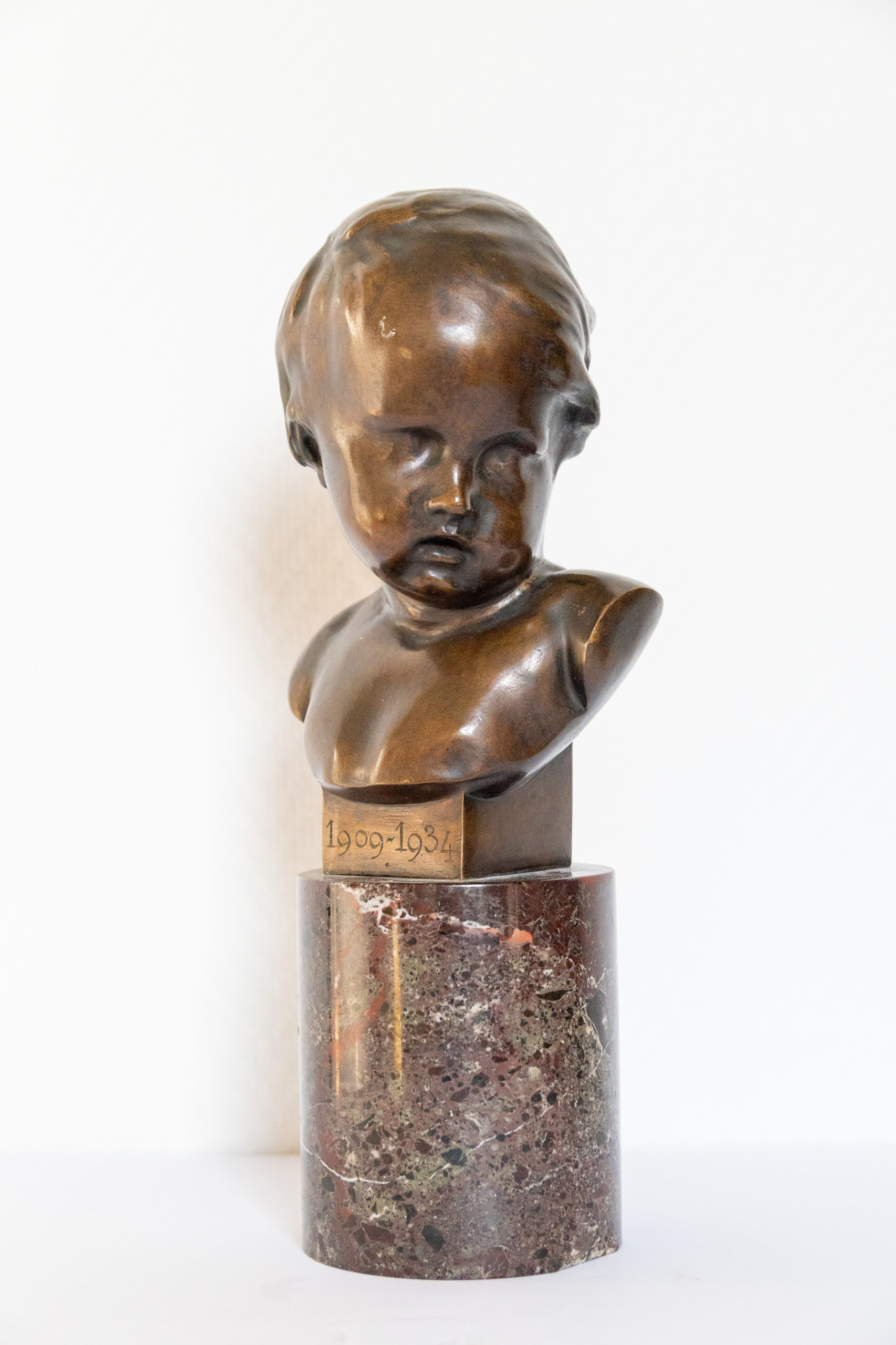 Buste-bronze-enfant-signé-Francois-duquesnoy-antiquité-bronze-aurore-morisse-antiquaire