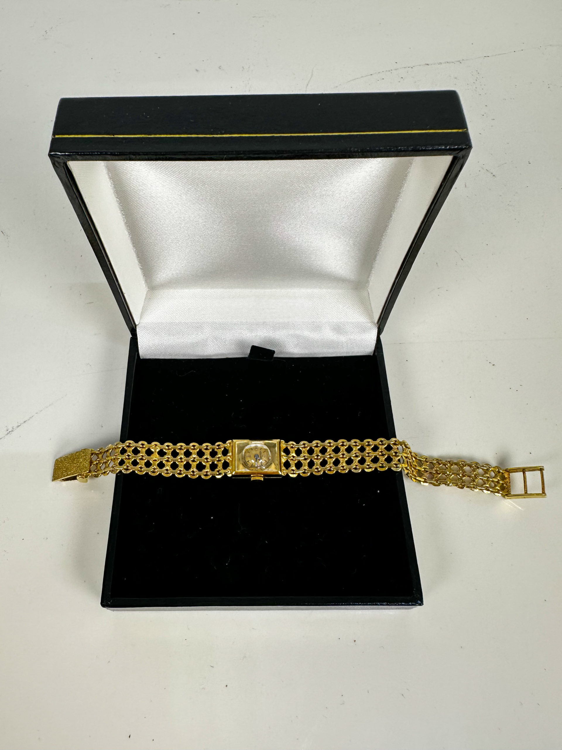 Bijoux• Montre en or